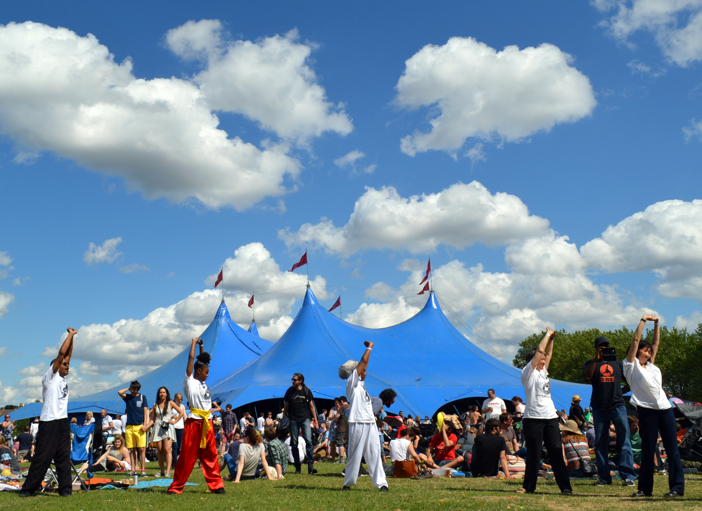 Dao Lu students and Shifu Aaron Whitaker warm up before performing tai chi (taiji) at Walthamstow Garden Party in Lloyd Park